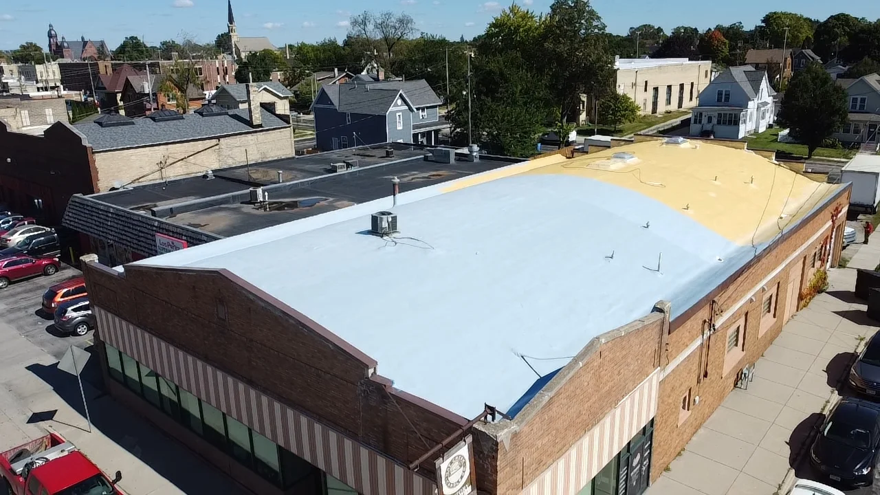 acrylic roof coating on commercial building